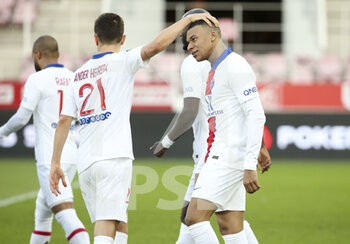 2021-02-27 - Kylian Mbappe of PSG celebrates his second goal with Ander Herrera (left) during the French championship Ligue 1 football match between Dijon FCO (DFCO) and Paris Saint-Germain (PSG) on February 27, 2021 at Stade Gaston Gerard in Dijon, France - Photo Jean Catuffe / DPPI - DIJON FCO (DFCO) AND PARIS SAINT-GERMAIN (PSG) - FRENCH LIGUE 1 - SOCCER