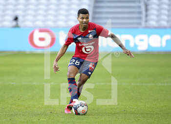 2021-02-28 - Reinildo Mandava of Lille during the French championship Ligue 1 football match between Lille OSC and RC Strasbourg on february 28, 2021 at Pierre Mauroy stadium in Villeneuve-d'Ascq near Lille, France - Photo Jean Catuffe / DPPI - LILLE OSC AND RC STRASBOURG - FRENCH LIGUE 1 - SOCCER