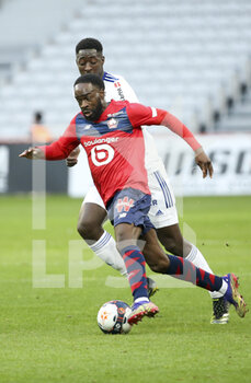 2021-02-28 - Jonathan Ikone of Lille, Ibrahima Sissoko of Strasbourg during the French championship Ligue 1 football match between Lille OSC and RC Strasbourg on february 28, 2021 at Pierre Mauroy stadium in Villeneuve-d'Ascq near Lille, France - Photo Jean Catuffe / DPPI - LILLE OSC AND RC STRASBOURG - FRENCH LIGUE 1 - SOCCER