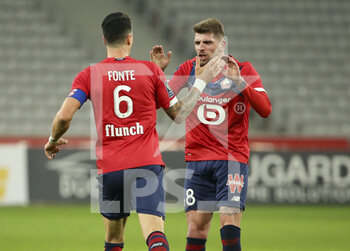 2021-02-28 - Jose Fonte of Lille celebrates his goal with Xeka of Lille during the French championship Ligue 1 football match between Lille OSC and RC Strasbourg on february 28, 2021 at Pierre Mauroy stadium in Villeneuve-d'Ascq near Lille, France - Photo Jean Catuffe / DPPI - LILLE OSC AND RC STRASBOURG - FRENCH LIGUE 1 - SOCCER