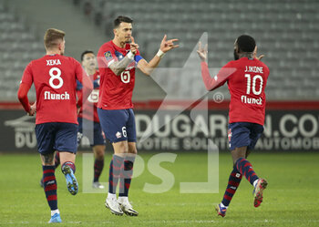 2021-02-28 - Jose Fonte of Lille celebrates his goal with Jonathan Ikone of Lille during the French championship Ligue 1 football match between Lille OSC and RC Strasbourg on february 28, 2021 at Pierre Mauroy stadium in Villeneuve-d'Ascq near Lille, France - Photo Jean Catuffe / DPPI - LILLE OSC AND RC STRASBOURG - FRENCH LIGUE 1 - SOCCER