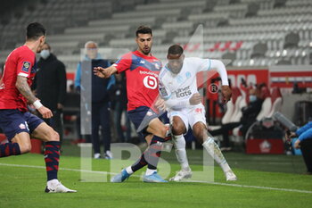 2021-03-03 - Duel Celik 2 losc and Ntcham 8 Marseille during the French championship Ligue 1 football match between Lille OSC and Olympique de Marseille on March 3, 2021 at Pierre Mauroy stadium in Villeneuve-d'Ascq near Lille, France - Photo Laurent Sanson / LS Medianord / DPPI - LILLE OSC AND OLYMPIQUE DE MARSEILLE - FRENCH LIGUE 1 - SOCCER
