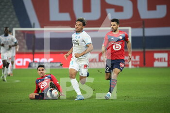 2021-03-03 - Duel Kamara 4 Marseille and Benjamin Andre 21 - Celik 2 losc during the French championship Ligue 1 football match between Lille OSC and Olympique de Marseille on March 3, 2021 at Pierre Mauroy stadium in Villeneuve-d'Ascq near Lille, France - Photo Laurent Sanson / LS Medianord / DPPI - LILLE OSC AND OLYMPIQUE DE MARSEILLE - FRENCH LIGUE 1 - SOCCER