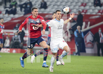 2021-03-03 - Sven Botman of Lille, Arkadiusz Milik of Marseille during the French championship Ligue 1 football match between Lille OSC and Olympique de Marseille on March 3, 2021 at Pierre Mauroy stadium in Villeneuve-d'Ascq near Lille, France - Photo Jean Catuffe / DPPI - LILLE OSC AND OLYMPIQUE DE MARSEILLE - FRENCH LIGUE 1 - SOCCER