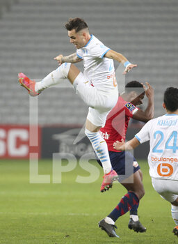 2021-03-03 - Pol Lirola of Marseille, Jonathan David of Lille during the French championship Ligue 1 football match between Lille OSC and Olympique de Marseille on March 3, 2021 at Pierre Mauroy stadium in Villeneuve-d'Ascq near Lille, France - Photo Jean Catuffe / DPPI - LILLE OSC AND OLYMPIQUE DE MARSEILLE - FRENCH LIGUE 1 - SOCCER