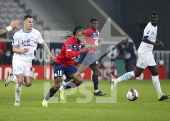 2021-03-03 - Renato Sanches of Lille, Arkadiusz Milik of Marseille (left) during the French championship Ligue 1 football match between Lille OSC and Olympique de Marseille on March 3, 2021 at Pierre Mauroy stadium in Villeneuve-d'Ascq near Lille, France - Photo Jean Catuffe / DPPI - LILLE OSC AND OLYMPIQUE DE MARSEILLE - FRENCH LIGUE 1 - SOCCER