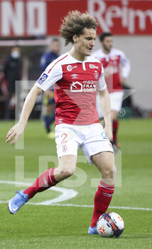 2021-03-12 - Wout Faes of Reims during the French championship Ligue 1 football match between Stade de Reims and Olympique Lyonnais (OL) on March 12, 2021 at Stade Auguste Delaune in Reims, France - Photo Jean Catuffe / DPPI - STADE DE REIMS AND OLYMPIQUE LYONNAIS (OL) - FRENCH LIGUE 1 - SOCCER