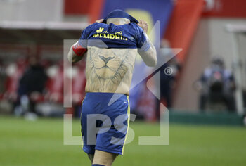 2021-03-12 - Memphis Depay of Lyon - showing his lion tattoo on his back - is frustrated during the French championship Ligue 1 football match between Stade de Reims and Olympique Lyonnais (OL) on March 12, 2021 at Stade Auguste Delaune in Reims, France - Photo Jean Catuffe / DPPI - STADE DE REIMS AND OLYMPIQUE LYONNAIS (OL) - FRENCH LIGUE 1 - SOCCER