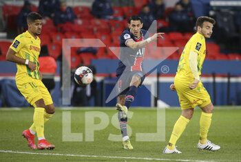 2021-03-14 - Angel Di Maria of PSG between Ludovic Blas and Pedro Chirivella of FC Nantes during the French championship Ligue 1 football match between Paris Saint-Germain and FC Nantes on March 14, 2021 at Parc des Princes stadium in Paris, France - Photo Jean Catuffe / DPPI - PARIS SAINT-GERMAIN AND FC NANTES - FRENCH LIGUE 1 - SOCCER
