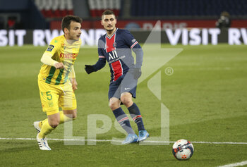 2021-03-14 - Marco Verratti of PSG, Pedro Chirivella of FC Nantes (left) during the French championship Ligue 1 football match between Paris Saint-Germain and FC Nantes on March 14, 2021 at Parc des Princes stadium in Paris, France - Photo Jean Catuffe / DPPI - PARIS SAINT-GERMAIN AND FC NANTES - FRENCH LIGUE 1 - SOCCER