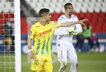 2021-03-14 - Ludovic Blas of FC Nantes, goalkeeper of FC Nantes Alban Lafont during the French championship Ligue 1 football match between Paris Saint-Germain and FC Nantes on March 14, 2021 at Parc des Princes stadium in Paris, France - Photo Jean Catuffe / DPPI - PARIS SAINT-GERMAIN AND FC NANTES - FRENCH LIGUE 1 - SOCCER