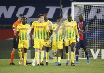 2021-03-14 - Players of Nantes celebrate the goal of Randal Kolo Muani of FC Nantes during the French championship Ligue 1 football match between Paris Saint-Germain and FC Nantes on March 14, 2021 at Parc des Princes stadium in Paris, France - Photo Jean Catuffe / DPPI - PARIS SAINT-GERMAIN AND FC NANTES - FRENCH LIGUE 1 - SOCCER