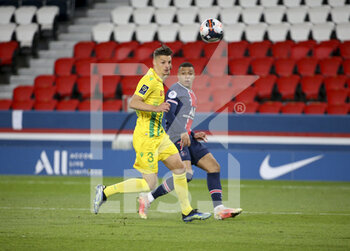 2021-03-14 - Andrei Girotto of FC Nantes, Kylian Mbappe of PSG during the French championship Ligue 1 football match between Paris Saint-Germain and FC Nantes on March 14, 2021 at Parc des Princes stadium in Paris, France - Photo Jean Catuffe / DPPI - PARIS SAINT-GERMAIN AND FC NANTES - FRENCH LIGUE 1 - SOCCER