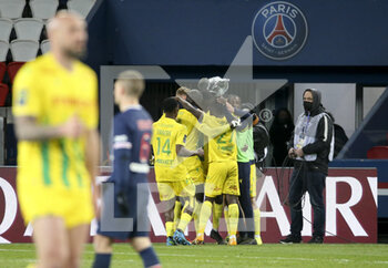 2021-03-14 - Moses Simon of FC Nantes celebrates his goal with teammates during the French championship Ligue 1 football match between Paris Saint-Germain and FC Nantes on March 14, 2021 at Parc des Princes stadium in Paris, France - Photo Jean Catuffe / DPPI - PARIS SAINT-GERMAIN AND FC NANTES - FRENCH LIGUE 1 - SOCCER