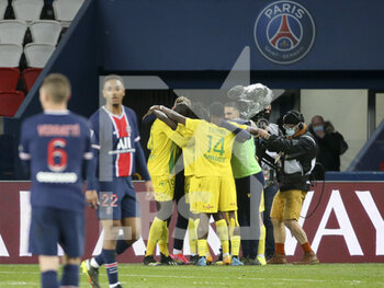 2021-03-14 - Moses Simon of FC Nantes celebrates his goal with teammates during the French championship Ligue 1 football match between Paris Saint-Germain and FC Nantes on March 14, 2021 at Parc des Princes stadium in Paris, France - Photo Jean Catuffe / DPPI - PARIS SAINT-GERMAIN AND FC NANTES - FRENCH LIGUE 1 - SOCCER