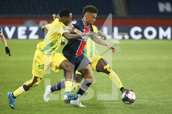 2021-03-14 - Thilo Kehrer of PSG, Charles Traore of FC Nantes (left) during the French championship Ligue 1 football match between Paris Saint-Germain and FC Nantes on March 14, 2021 at Parc des Princes stadium in Paris, France - Photo Jean Catuffe / DPPI - PARIS SAINT-GERMAIN AND FC NANTES - FRENCH LIGUE 1 - SOCCER