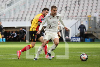 2021-03-14 - Duel Thomas Delaine 17 Metz and Jonathan Clauss 11 Lens during the French championship Ligue 1 football match between RC Lens and FC Metz on March 14, 2021 at Bollaert-Delelis stadium in Lens, France - Photo Laurent Sanson / LS Medianord / DPPI - RC LENS AND FC METZ - FRENCH LIGUE 1 - SOCCER