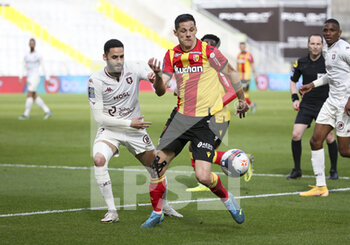 2021-03-14 - Dylan Bronn of FC Metz, Florian Sotoca of Lens during the French championship Ligue 1 football match between RC Lens and FC Metz on March 14, 2021 at Stade Bollaert-Delelis in Lens, France - Photo Jean Catuffe / DPPI - RC LENS AND FC METZ - FRENCH LIGUE 1 - SOCCER