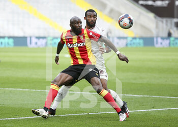 2021-03-14 - Seko Fofana of Lens, Habib Maiga of FC Metz during the French championship Ligue 1 football match between RC Lens and FC Metz on March 14, 2021 at Stade Bollaert-Delelis in Lens, France - Photo Jean Catuffe / DPPI - RC LENS AND FC METZ - FRENCH LIGUE 1 - SOCCER