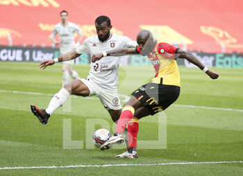 2021-03-14 - Seko Fofana of Lens, Habib Maiga of FC Metz (left) during the French championship Ligue 1 football match between RC Lens and FC Metz on March 14, 2021 at Stade Bollaert-Delelis in Lens, France - Photo Jean Catuffe / DPPI - RC LENS AND FC METZ - FRENCH LIGUE 1 - SOCCER
