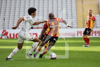 2021-03-14 - Matthieu Udol 3 Metz and Gaël Kakuta 10 Lens during the French championship Ligue 1 football match between RC Lens and FC Metz on March 14, 2021 at Bollaert-Delelis stadium in Lens, France - Photo Laurent Sanson / LS Medianord / DPPI - RC LENS AND FC METZ - FRENCH LIGUE 1 - SOCCER