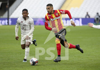 2021-03-14 - Facundo Medina of Lens, Jose Dias Goncalves Vagner of FC Metz (left) during the French championship Ligue 1 football match between RC Lens and FC Metz on March 14, 2021 at Stade Bollaert-Delelis in Lens, France - Photo Jean Catuffe / DPPI - RC LENS AND FC METZ - FRENCH LIGUE 1 - SOCCER