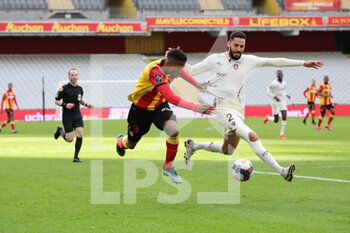 2021-03-14 - Duel Simon Banza 23 Lens and Dylan Bronn 2 Metz during the French championship Ligue 1 football match between RC Lens and FC Metz on March 14, 2021 at Bollaert-Delelis stadium in Lens, France - Photo Laurent Sanson / LS Medianord / DPPI - RC LENS AND FC METZ - FRENCH LIGUE 1 - SOCCER