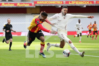 2021-03-14 - Duel Simon Banza 23 Lens and Dylan Bronn 2 Metz during the French championship Ligue 1 football match between RC Lens and FC Metz on March 14, 2021 at Bollaert-Delelis stadium in Lens, France - Photo Laurent Sanson / LS Medianord / DPPI - RC LENS AND FC METZ - FRENCH LIGUE 1 - SOCCER