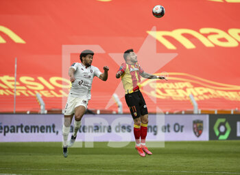 2021-03-14 - Matthieu Udol of FC Metz, Jonathan Clauss of Lens during the French championship Ligue 1 football match between RC Lens and FC Metz on March 14, 2021 at Stade Bollaert-Delelis in Lens, France - Photo Jean Catuffe / DPPI - RC LENS AND FC METZ - FRENCH LIGUE 1 - SOCCER