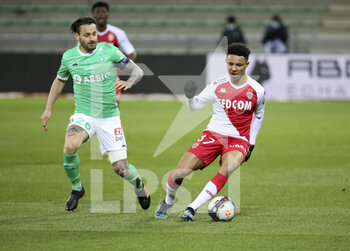 2021-03-19 - Sofiane Diop of Monaco, Mathieu Debuchy of Saint-Etienne (left) during the French championship Ligue 1 football match between AS Saint-Etienne (ASSE) and AS Monaco (ASM) on March 19, 2021 at Stade Geoffroy Guichard in Saint-Etienne, France - Photo Jean Catuffe / DPPI - AS SAINT-ETIENNE (ASSE) AND AS MONACO (ASM) - FRENCH LIGUE 1 - SOCCER