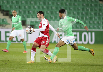 2021-03-19 - Kevin Volland of Monaco, Mahdi Camara of Saint-Etienne during the French championship Ligue 1 football match between AS Saint-Etienne (ASSE) and AS Monaco (ASM) on March 19, 2021 at Stade Geoffroy Guichard in Saint-Etienne, France - Photo Jean Catuffe / DPPI - AS SAINT-ETIENNE (ASSE) AND AS MONACO (ASM) - FRENCH LIGUE 1 - SOCCER