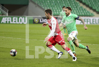 2021-03-19 - Stevan Jovetic of Monaco, Mathieu Debuchy of Saint-Etienne during the French championship Ligue 1 football match between AS Saint-Etienne (ASSE) and AS Monaco (ASM) on March 19, 2021 at Stade Geoffroy Guichard in Saint-Etienne, France - Photo Jean Catuffe / DPPI - AS SAINT-ETIENNE (ASSE) AND AS MONACO (ASM) - FRENCH LIGUE 1 - SOCCER