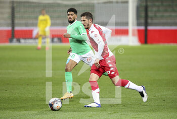 2021-03-19 - Stevan Jovetic of Monaco, Mahdi Camara of Saint-Etienne (left) during the French championship Ligue 1 football match between AS Saint-Etienne (ASSE) and AS Monaco (ASM) on March 19, 2021 at Stade Geoffroy Guichard in Saint-Etienne, France - Photo Jean Catuffe / DPPI - AS SAINT-ETIENNE (ASSE) AND AS MONACO (ASM) - FRENCH LIGUE 1 - SOCCER