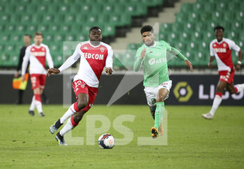 2021-03-19 - Youssouf Fofana of Monaco, Mahdi Camara of Saint-Etienne during the French championship Ligue 1 football match between AS Saint-Etienne (ASSE) and AS Monaco (ASM) on March 19, 2021 at Stade Geoffroy Guichard in Saint-Etienne, France - Photo Jean Catuffe / DPPI - AS SAINT-ETIENNE (ASSE) AND AS MONACO (ASM) - FRENCH LIGUE 1 - SOCCER