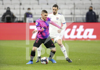 2021-03-21 - Marco Verratti of PSG, Mattia De Sciglio of Lyon during the French championship Ligue 1 football match between Olympique Lyonnais (OL) and Paris Saint-Germain (PSG) on March 21, 2021 at Groupama stadium in Decines-Charpieu near Lyon, France - Photo Jean Catuffe / DPPI - OLYMPIQUE LYONNAIS AND PARIS SAINT-GERMAIN - FRENCH LIGUE 1 - SOCCER