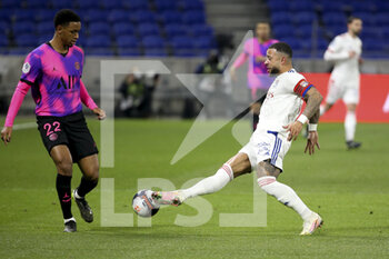 2021-03-21 - Memphis Depay of Lyon, Abdou Diallo of PSG (left) during the French championship Ligue 1 football match between Olympique Lyonnais (OL) and Paris Saint-Germain (PSG) on March 21, 2021 at Groupama stadium in Decines-Charpieu near Lyon, France - Photo Jean Catuffe / DPPI - OLYMPIQUE LYONNAIS AND PARIS SAINT-GERMAIN - FRENCH LIGUE 1 - SOCCER