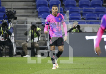 2021-03-21 - Kylian Mbappe of PSG celebrates his first goal during the French championship Ligue 1 football match between Olympique Lyonnais (OL) and Paris Saint-Germain (PSG) on March 21, 2021 at Groupama stadium in Decines-Charpieu near Lyon, France - Photo Jean Catuffe / DPPI - OLYMPIQUE LYONNAIS AND PARIS SAINT-GERMAIN - FRENCH LIGUE 1 - SOCCER