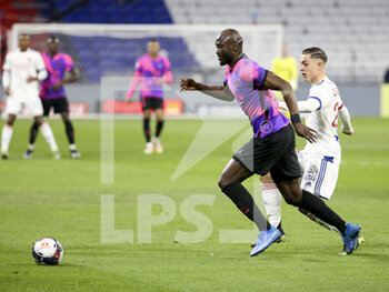 2021-03-21 - Danilo Pereira of PSG, Maxence Caqueret of Lyon during the French championship Ligue 1 football match between Olympique Lyonnais (OL) and Paris Saint-Germain (PSG) on March 21, 2021 at Groupama stadium in Decines-Charpieu near Lyon, France - Photo Jean Catuffe / DPPI - OLYMPIQUE LYONNAIS AND PARIS SAINT-GERMAIN - FRENCH LIGUE 1 - SOCCER