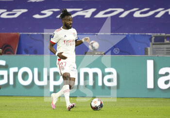 2021-03-21 - Maxwel Cornet of Lyon during the French championship Ligue 1 football match between Olympique Lyonnais (OL) and Paris Saint-Germain (PSG) on March 21, 2021 at Groupama stadium in Decines-Charpieu near Lyon, France - Photo Jean Catuffe / DPPI - OLYMPIQUE LYONNAIS AND PARIS SAINT-GERMAIN - FRENCH LIGUE 1 - SOCCER