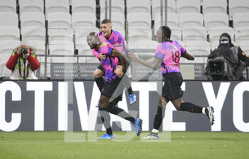 2021-03-21 - Danilo Pereira of PSG celebrates his goal with Marco Verratti, Moise Kean during the French championship Ligue 1 football match between Olympique Lyonnais (OL) and Paris Saint-Germain (PSG) on March 21, 2021 at Groupama stadium in Decines-Charpieu near Lyon, France - Photo Jean Catuffe / DPPI - OLYMPIQUE LYONNAIS AND PARIS SAINT-GERMAIN - FRENCH LIGUE 1 - SOCCER
