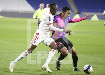 2021-03-21 - Tino Kadewere of Lyon, Abdou Diallo of PSG during the French championship Ligue 1 football match between Olympique Lyonnais (OL) and Paris Saint-Germain (PSG) on March 21, 2021 at Groupama stadium in Decines-Charpieu near Lyon, France - Photo Jean Catuffe / DPPI - OLYMPIQUE LYONNAIS AND PARIS SAINT-GERMAIN - FRENCH LIGUE 1 - SOCCER