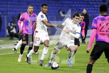 2021-03-21 - Thiago Mendes, Lucas Paqueta of Lyon during the French championship Ligue 1 football match between Olympique Lyonnais (OL) and Paris Saint-Germain (PSG) on March 21, 2021 at Groupama stadium in Decines-Charpieu near Lyon, France - Photo Jean Catuffe / DPPI - OLYMPIQUE LYONNAIS AND PARIS SAINT-GERMAIN - FRENCH LIGUE 1 - SOCCER
