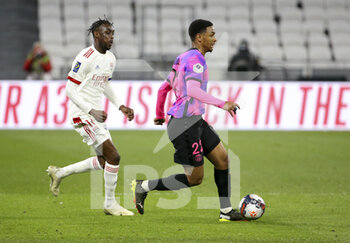2021-03-21 - Abdou Diallo of PSG, Tino Kadewere of Lyon (left) during the French championship Ligue 1 football match between Olympique Lyonnais (OL) and Paris Saint-Germain (PSG) on March 21, 2021 at Groupama stadium in Decines-Charpieu near Lyon, France - Photo Jean Catuffe / DPPI - OLYMPIQUE LYONNAIS AND PARIS SAINT-GERMAIN - FRENCH LIGUE 1 - SOCCER