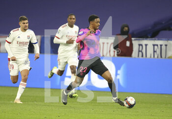 2021-03-21 - Abdou Diallo of PSG, Bruno Guimaraes of Lyon (left) during the French championship Ligue 1 football match between Olympique Lyonnais (OL) and Paris Saint-Germain (PSG) on March 21, 2021 at Groupama stadium in Decines-Charpieu near Lyon, France - Photo Jean Catuffe / DPPI - OLYMPIQUE LYONNAIS AND PARIS SAINT-GERMAIN - FRENCH LIGUE 1 - SOCCER
