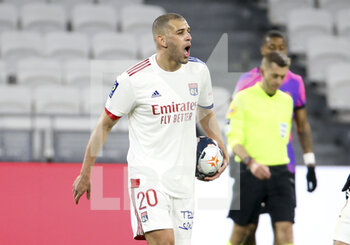 2021-03-21 - Islam Slimani of Lyon celebrates his goal during the French championship Ligue 1 football match between Olympique Lyonnais (OL) and Paris Saint-Germain (PSG) on March 21, 2021 at Groupama stadium in Decines-Charpieu near Lyon, France - Photo Jean Catuffe / DPPI - OLYMPIQUE LYONNAIS AND PARIS SAINT-GERMAIN - FRENCH LIGUE 1 - SOCCER