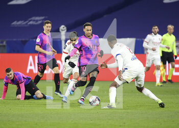 2021-03-21 - Neymar Jr of PSG followed by Lucas Paqueta of Lyon during the French championship Ligue 1 football match between Olympique Lyonnais (OL) and Paris Saint-Germain (PSG) on March 21, 2021 at Groupama stadium in Decines-Charpieu near Lyon, France - Photo Jean Catuffe / DPPI - OLYMPIQUE LYONNAIS AND PARIS SAINT-GERMAIN - FRENCH LIGUE 1 - SOCCER