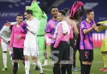 2021-03-21 - Abdou Diallo, Neymar Jr of PSG celebrate the victory following the French championship Ligue 1 football match between Olympique Lyonnais (OL) and Paris Saint-Germain (PSG) on March 21, 2021 at Groupama stadium in Decines-Charpieu near Lyon, France - Photo Jean Catuffe / DPPI - OLYMPIQUE LYONNAIS AND PARIS SAINT-GERMAIN - FRENCH LIGUE 1 - SOCCER