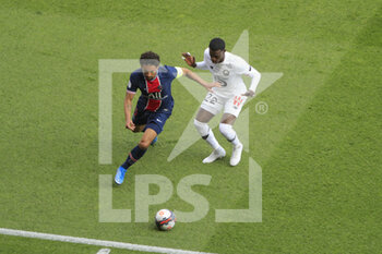 2021-04-03 - Marcos Aoas Correa, Marquinhos (PSG) and Timothy WEAH (Lille OSC) battled for the ball during the French championship Ligue 1 football match between Paris Saint-Germain and LOSC Lille on April 3, 2021 at Parc des Princes stadium in Paris, France - Photo Stephane Allaman / DPPI - PARIS SAINT-GERMAIN AND LOSC LILLE - FRENCH LIGUE 1 - SOCCER