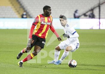 2021-04-03 - Massadio Haidara of Lens, Lucas Paqueta of Lyon during the French championship Ligue 1 football match between RC Lens and Olympique Lyonnais (OL, Lyon) on April 3, 2021 at Stade Bollaert-Delelis in Lens, France - Photo Jean Catuffe / DPPI - RC LENS VS OLYMPIQUE LYONNAIS - FRENCH LIGUE 1 - SOCCER