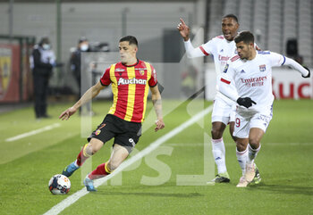 2021-04-03 - Florian Sotoca of Lens, Marcelo Guedes, Bruno Guimaraes of Lyon during the French championship Ligue 1 football match between RC Lens and Olympique Lyonnais (OL, Lyon) on April 3, 2021 at Stade Bollaert-Delelis in Lens, France - Photo Jean Catuffe / DPPI - RC LENS VS OLYMPIQUE LYONNAIS - FRENCH LIGUE 1 - SOCCER